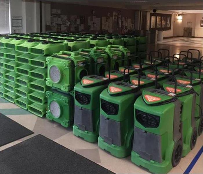 SERVPRO Equipment stacked in rows