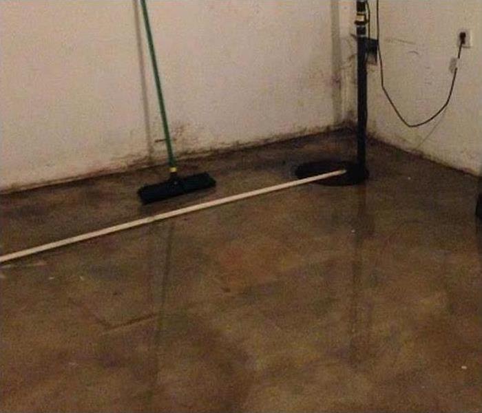 wet basement floor after a storm